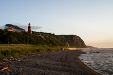 Coastal Sunset On A Clifftop Lighthouse