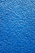 Close Up Of Painted Blue Stucco Wall