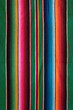 © Sonja Lekovic/Stocksy - mexican colorful striped textile background