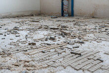 Concrete Wall And Floor, Construction Or Destruction Site With Remnants Of Tile Adhesive