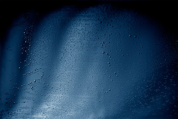 Wall Mural - Blue abstract background with tiny bubbles of air.
