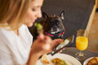© Svitlana - Blogger ignoring her pet during the food photography