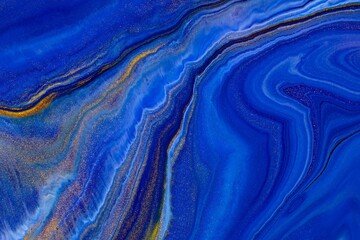  Fluid art texture. Background with abstract iridescent paint effect. Liquid acrylic picture with artistic mixed paints. Classic blue color of the year 2020. Blue, golden and white overflowing colors