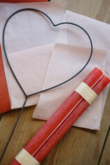 Aromatic candles. Red paper and decorative heart on a Valentines day