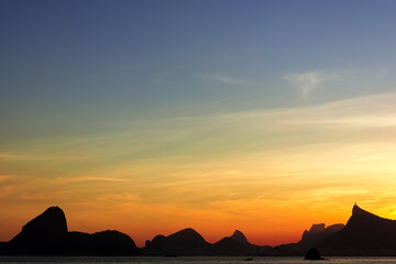 Wall Mural - Beautiful Rio de Janeiro Mountain Silhouette View With Sunset Sky