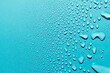 Water drops on blue background, macro