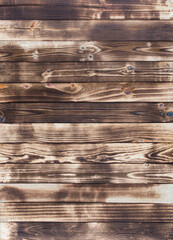 Aufkleber - Wooden floor with traces of being burnt makes a black abstract background and texture.