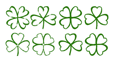 Sketch line clover. Set of Hand drawn brush shamrocks on white background.