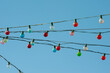 Low Angle View Of Decoration Hanging Against Clear Sky