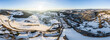 Bild einer Luftaufnahme mit einer Drohne der Stadt Grafenau im bayerischen Wald mit Bergen Arber Rachel und Lusen im Winter mit Schnee und Eis, Deutschland