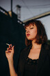 © марина прищепа - girl in black sexy smokes on the embankment