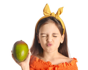 Wall Mural - Grimacing little girl with fresh mango on white background