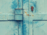 Fototapeta Młodzieżowe - Vintage industrial metal door gate with obsolete locks