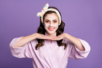 Canvas Print - Photo portrait of cheerful girl wearing bathrobe looking in mirror on cosmetic treatment effect isolated on vivid violet color background