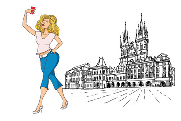 Wall Mural - Girl tourist makes selfie in Prague, The Church of Our Lady before Tyn , Prague, Czech Republic on the background.