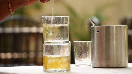 Wall Mural - Close shot of dissolving wine, Dissolving wine filled in a transparent glass