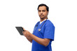 © Syda Productions - medicine, healthcare and technology concept - indian doctor or male nurse in blue uniform with stethoscope using tablet pc computer over white background