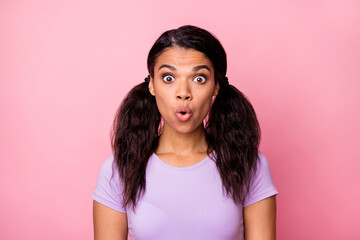 Wall Mural - Photo of shocked dark skin astonished girl unbelievable news isolated on pastel pink color background