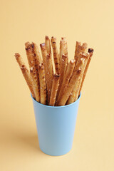 Wall Mural - Bread sticks in a glass