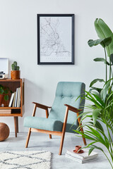 Stylish interior of living room with design wooden shelf, retro armchair, plants, mock up poster map, decoration, book, cacti and personal accessories in retro home decor. Template.