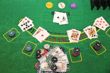 playing poker in a casino cards money chips on the poker table