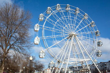 
ferris wheel on a winter sunny day in the city