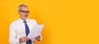 © carballo - businessman looking at documents isolated