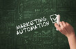 © ra2 studio - Hand drawing MARKETING AUTOMATION inscription with white chalk on blackboard, new business concept
