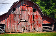 Front Of Faded Red Wooden Barn