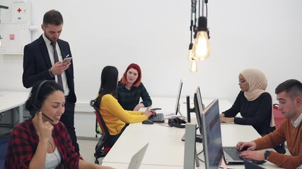 Web design team discussing a website solution in coworking startup office
