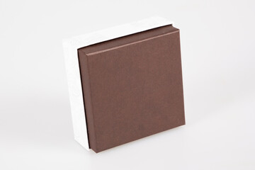 Wall Mural - single simple small Gift Box with brown cower in grey background