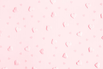 Valentine's Day background. Pink hearts on pastel pink background. Valentines day concept. Flat lay, top view, copy space