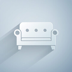 Wall Mural - Paper cut Sofa icon isolated on grey background. Paper art style. Vector.