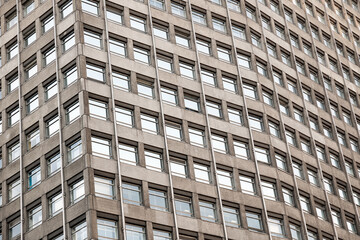 Exterior of Portland House, a concrete office skyscraper in Westminster, London