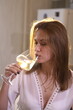 © Pretti - Girl drinking white wine