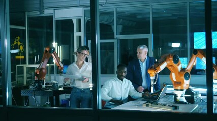Wall Mural - professional engineers working at modern industrial laboratory. scientists are experimenting with ro