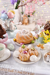 Wall Mural - traditional Easter variety of cakes on festive table