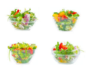 Wall Mural - Fresh green vegetable and lettuce salad in glass plate