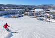 Skier on Mont Tremblant village resort in winter, Quebec, Canada