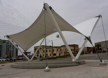 A Tensile Structure Comprising A Membrane Roof Steel Columns And Cables