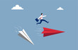 © Diki - Business and career path concept. Businessman jump over the new paper plane illustration.