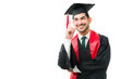 © AntonioDiaz - Hispanic man smiling while graduating from university