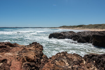 waves crashing on rocks