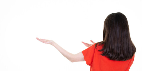 young happy woman presenting product rear back view on white background