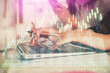 © peshkova - Multi exposure of woman hands typing on computer and financial graph hologram drawing. Stock market analysis concept.