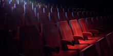 Empty Movie Theatre With Red Seat Pads