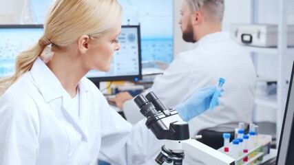 Wall Mural - professional team of scientists is working on a vaccine in a modern scientific research laboratory. 