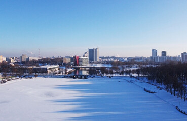 Wall Mural - Top view of snowy city park in winter