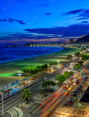 Night view of Copacabana beach and Avenida Atlantica in Rio de Janeiro, Brazil. Copacabana beach is the most famous beach of Rio de Janeiro, Brazil. Skyline of Rio de Janeiro. © Ekaterina Belova