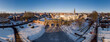 © Maarten Zeehandelaar - Aerial view of Hanseatic medieval boat portal Berkelpoort and city wall of Zutphen with frozen over river and winter landscape with snow lit up by morning sun against a clear blue sky